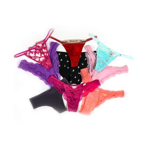 A variety of Victoria's Secret and Pink women's underwear, including lace and cotton designs in various colors such as red, purple, black, teal, pink, and orange, arranged in a circular pattern.