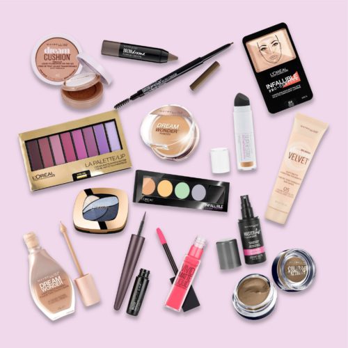 A collection of foundations, pomade crayons, contours, and eyeshadow palettes products from Maybelline and L'Oréal on a pink background