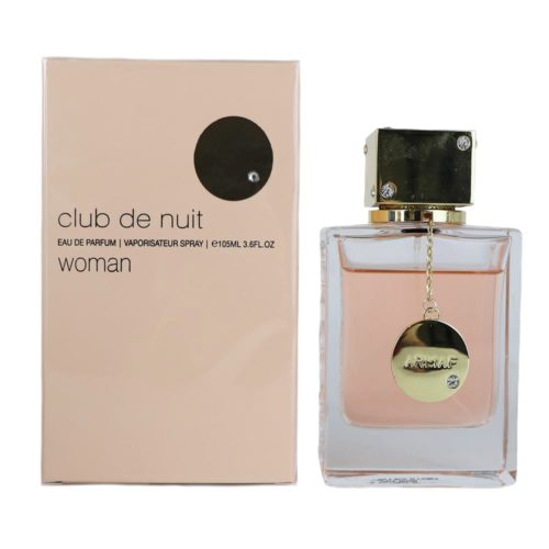 Perfume Club de Nuit Eau de Parfum 105 ml para mujer de Armaf. Caja en tono durazno y frasco transparente con tapa dorada y medallón colgante.