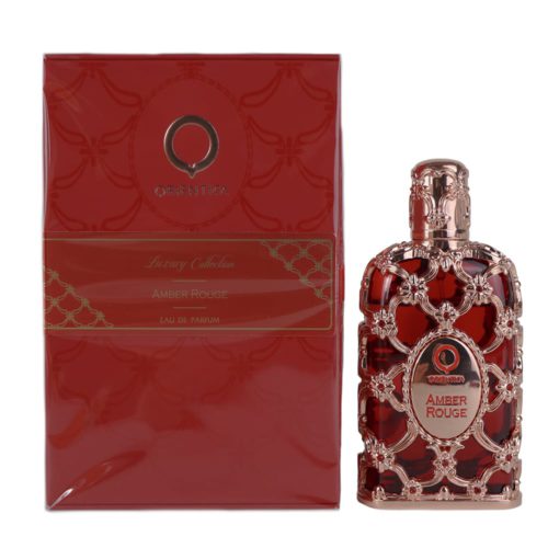 Amber Rouge Eau de Parfum de Orientica, con un lujoso frasco de vidrio rojo con detalles intrincados en oro rosa, acompañado de una caja roja a juego