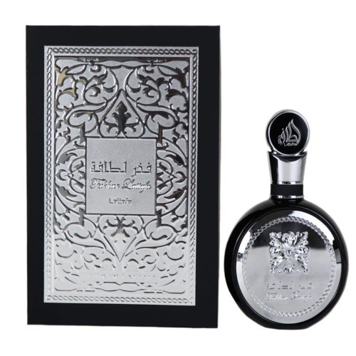 Perfume Fakhar Lattafa con un frasco redondo en negro y plateado con detalles ornamentales, junto a una caja negra con diseño plateado intrincado y texto en árabe.