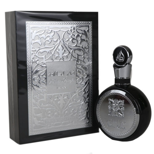 Fakhar Eau de Parfum de Lattafa para hombre, 100 ml, con el frasco colocado junto a su envase ornamentado en negro y plata.