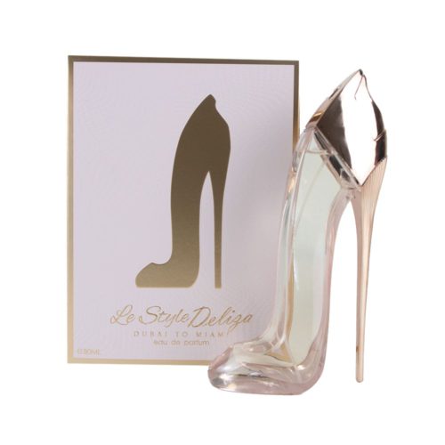 Vista frontal de Le Style Deliza Dubai to Miami EDP 80ml para mujer de Zoghbi. El frasco del perfume está diseñado en forma de zapato de tacón alto, colocado junto al envase que presenta la silueta de un tacón alto.