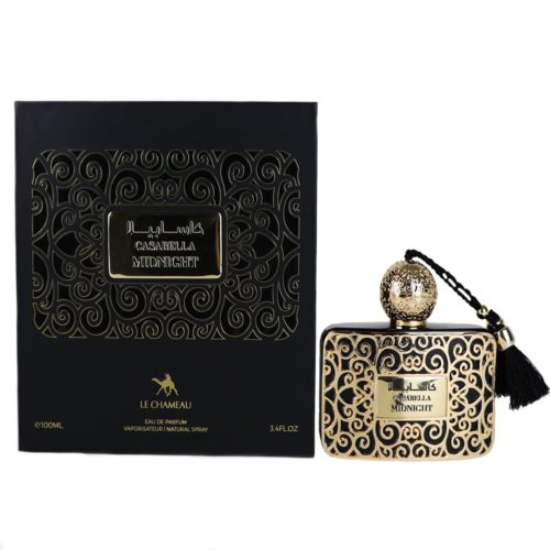 Un frasco de perfume rectangular negro con intrincados patrones dorados, rematado con una tapa texturizada dorada y un fleco negro, junto a un empaque negro y dorado a juego etiquetado como "Casabella Midnight."