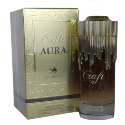 Envase dorado del Eau de Parfum Craft Aura de Le Chameau, junto al frasco cilíndrico a juego con crestas decorativas y diseño degradado de dorado a marrón.