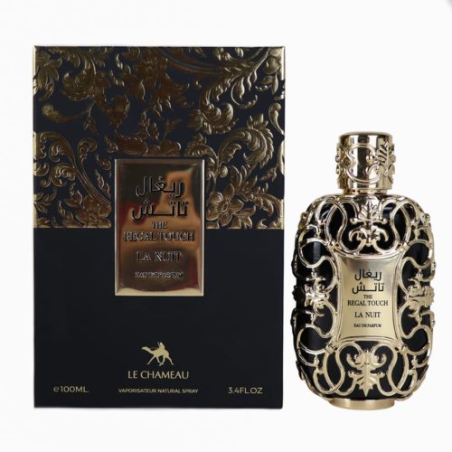 Un frasco de perfume dorado ornamentado con intrincados diseños florales y detalles negros, junto a un empaque negro y dorado a juego etiquetado como "The Regal Touch La Nuit Eau de Parfum."