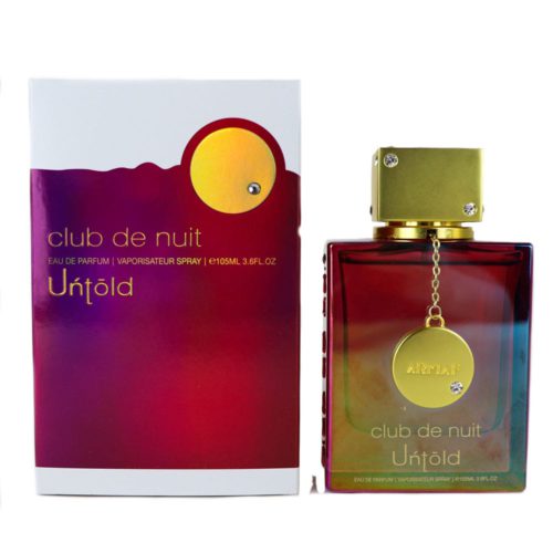Eau de Parfum Armaf Club de Nuit Untold, 3.6 fl oz (105 ml). La botella de perfume tiene un diseño de vidrio con degradado iridiscente, detalles dorados, una tapa cuadrada dorada con incrustaciones de cristal y un medallón colgante dorado. El empaque presenta un degradado inspirado en el atardecer con letras doradas y un emblema circular.