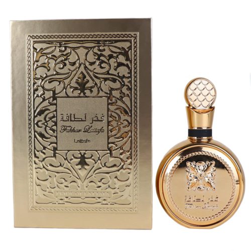 Fakhar Lattafa Eau de Parfum, con un lujoso frasco de perfume dorado con detalles intrincados, junto a una caja de embalaje con relieve dorado ornamentado.