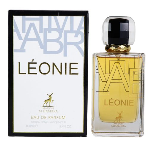 Un frasco de perfume rectangular transparente lleno de líquido dorado, con una tapa facetada negra y dorada, junto a un empaque blanco y negro etiquetado como "Léonie."