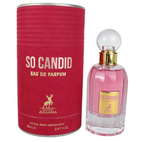 Un frasco de perfume de vidrio transparente lleno de líquido rosado, con una tapa esférica transparente, junto a un empaque cilíndrico rojo etiquetado como "So Candid Eau de Parfum."