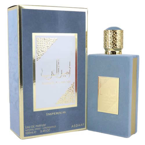 Ameer Al Arab Imperium Eau de Parfum de Asdaaf, 100 ml, frasco de suave textura azul con detalles dorados, expuesto junto a su caja a juego.