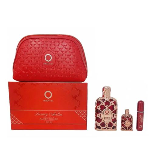 Set de regalo Orientica Amber Rouge Luxury Collection con un neceser rojo, un frasco de perfume de tamaño normal, un mini frasco y un spray de viaje, todo ello presentado en una caja decorativa.