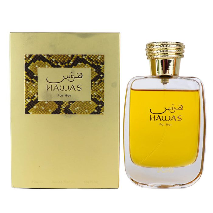 Un frasco de perfume rectangular lleno de líquido dorado con una tapa texturizada en oro, junto a su empaque dorado a juego etiquetado como "Hawas For Her."