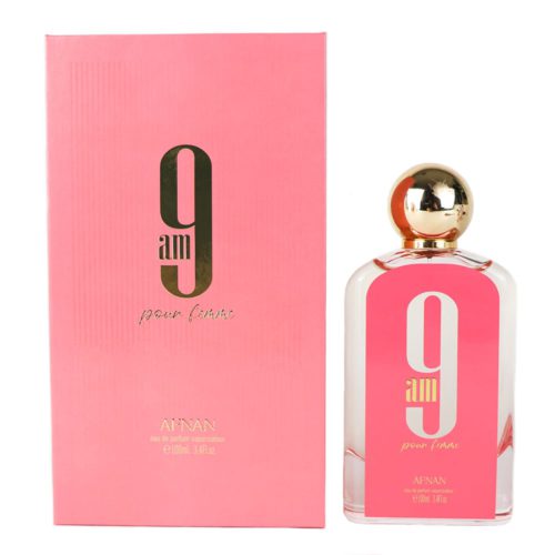 Vista frontal del estuche de perfume rosa y dorado «9 AM pour femme» colocado junto al frasco de perfume transparente a juego con tapón dorado, mostrando el armonioso diseño.