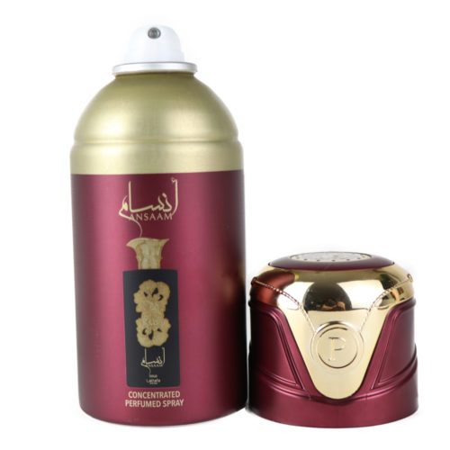 Lattafa Pride Ansaam Gold Spray perfumado concentrado para mujer, 200 ml, con el tapón quitado, mostrando la boquilla del spray. El frasco tiene un lujoso diseño granate y dorado con una etiqueta decorativa.