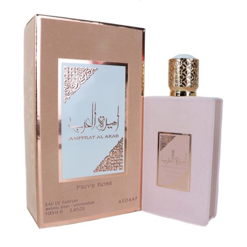 Frasco de perfume Asdaaf Ameerat Al Arab Prive Rose junto a su caja a juego en color rosa y dorado, con diseños elegantes.