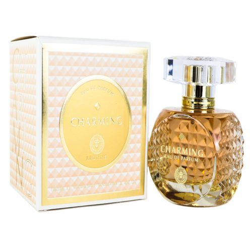 Charming Eau de Parfum de Lionne, que presenta un frasco ámbar dorado de 100 ml con diseño facetado, junto a su caja dorada y blanca a juego.