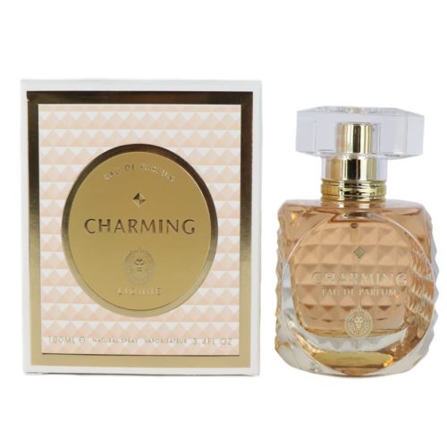 Charming Eau de Parfum de Lionne, que muestra un frasco ámbar dorado de 100 ml junto a su caja blanca y dorada con patrones geométricos.
