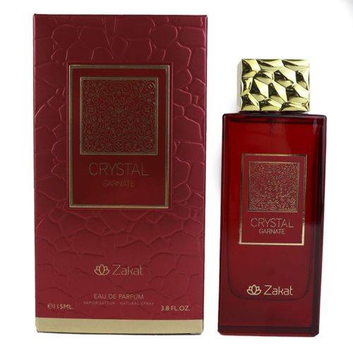 Una caja rectangular roja vibrante de "Crystal Garnate" Eau de Parfum de Zakat, con patrones dorados intrincados y logo, junto con el frasco de perfume rojo a juego con una tapa dorada texturizada.