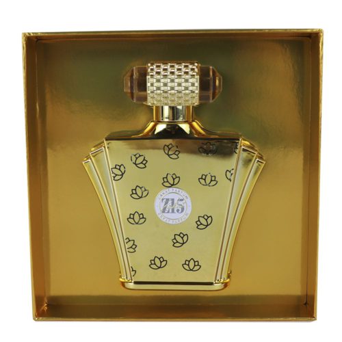Caja abierta de Zakat Parfum Z17, mostrando el frasco dorado del perfume dentro de un interior lujoso.