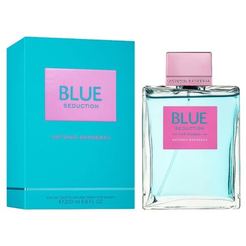 Blue Seduction para Mujer de Antonio Banderas, un Eau de Toilette de 200 ml. La fragancia se presenta en un frasco de vidrio transparente con tinte azul, tapa rosa y etiqueta rosa, junto con una caja de empaque en tonos turquesa y rosa.
