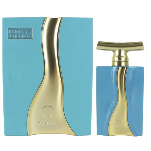 Un set de perfume de lujo Melodie de Orientica, con una botella en azul y dorado junto a su empaque a juego, que tiene un elegante acento curvo en dorado.