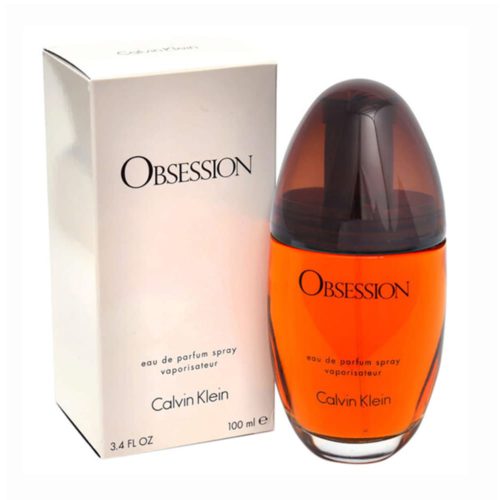 Eau de Parfum Calvin Klein Obsession para mujer, 3.4 fl oz (100 ml). La botella de perfume tiene forma ovalada con líquido ámbar y una tapa marrón oscura. El empaque es una caja color crema con texto en negro.