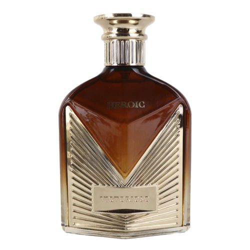 Un lujoso frasco de Victorioso Heroic Eau de Parfum de Maison Alhambra. El frasco de vidrio tiene un diseño degradado de marrón a dorado con detalles dorados y las palabras "Victorioso Heroic" grabadas.