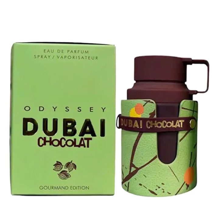 Odyssey Dubai Chocolat Gourmand Edition EDP 100ml para hombre de Armaf. El frasco de perfume tiene un diseño único en marrón y verde con una correa de cuero, junto a su caja verde a juego.