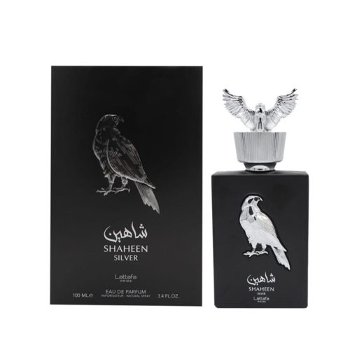 Vista frontal de la caja y frasco del perfume Pride Shaheen Silver EDP con emblema de halcón plateado y texto árabe sobre fondo negro mate.