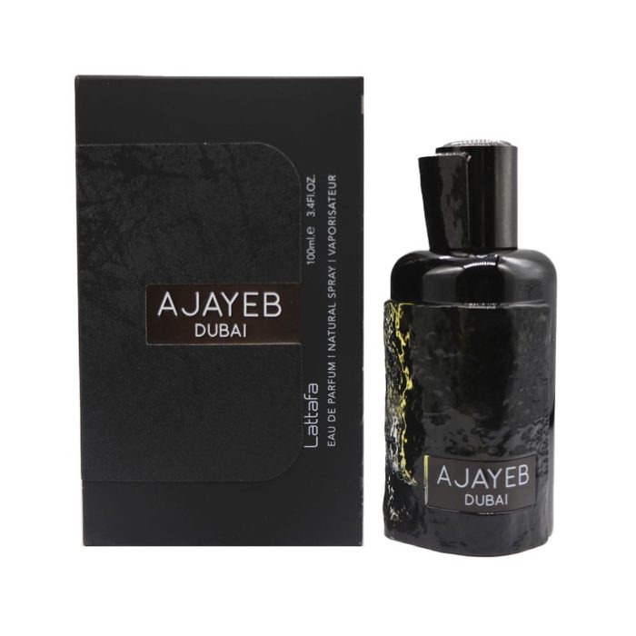 Imagen del perfume Ajayeb Dubai EDP 100 ml de Lattafa, mostrando el elegante frasco negro junto a su caja texturizada con logotipo plateado.