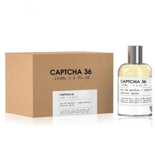 Vista frontal del perfume Captcha 36 EDP 100 ml de Emper, con frasco transparente minimalista, tapa plateada y caja tipo kraft con tipografía negra sencilla.