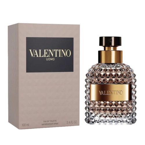 Vista frontal del perfume Valentino Uomo Eau de Toilette 100 ml, con una caja beige y letras doradas, junto a un frasco de vidrio con diseño de diamantes y detalle dorado.